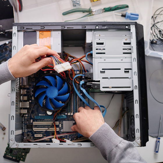 An open computer being fixed