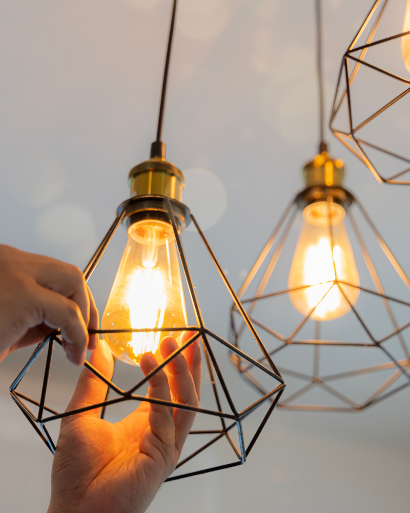replacing lightbulbs in a chandelier